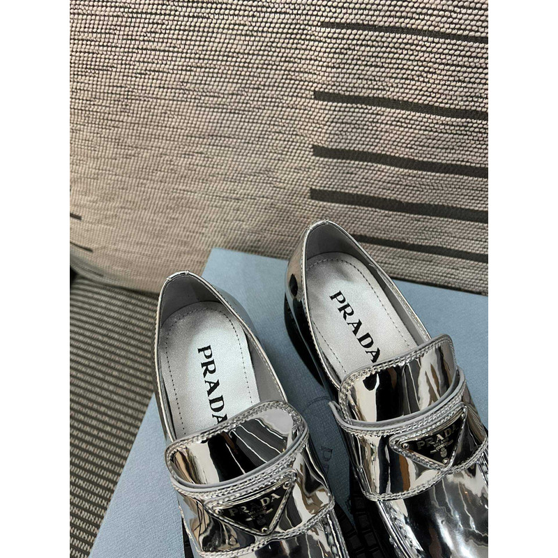 Pra*a triangle logo metallic loafers silver