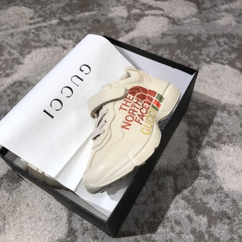 g*u*i x the n0*h F**e kids sneakers