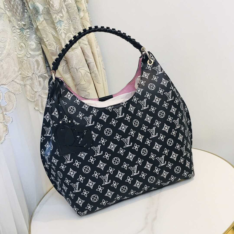 l**is V*t*n m21299 carmel mahina leather bag