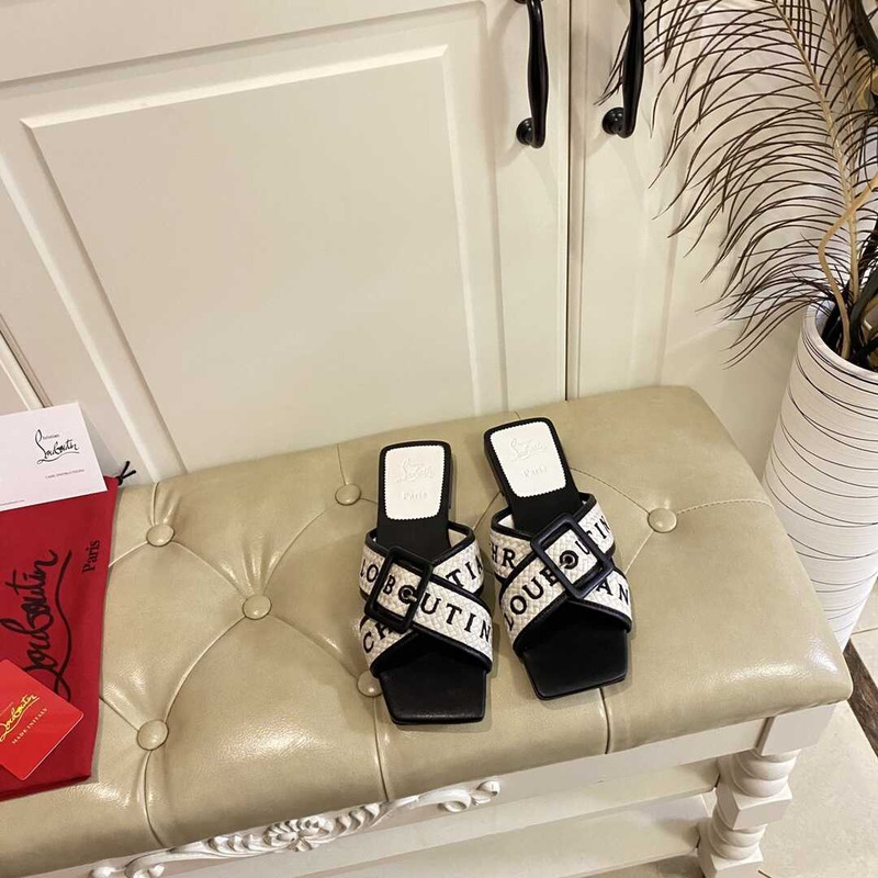 Ch**an louboutin crossimule leather sandals white black