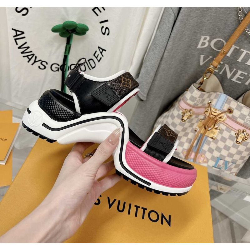 l**is V*t*n archlight sandal black and pink