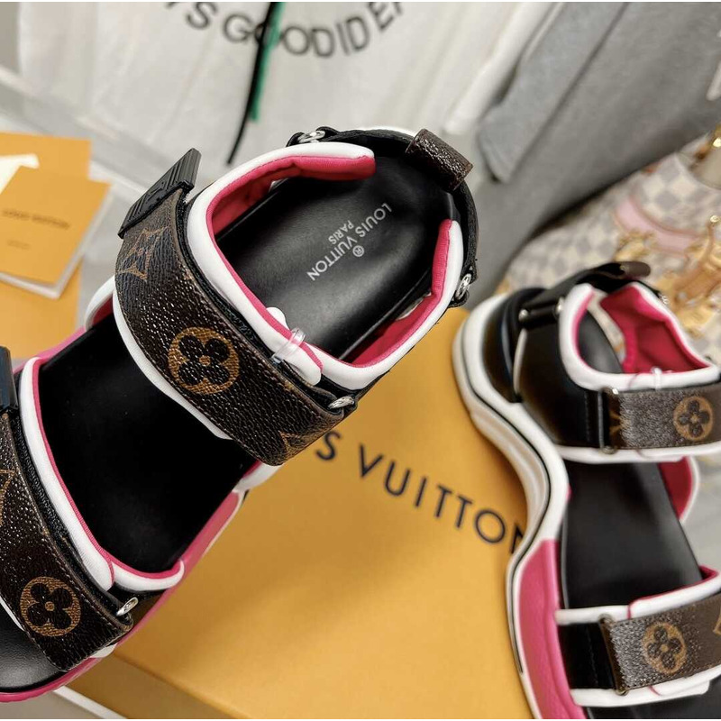 l**is V*t*n archlight sandal black and pink