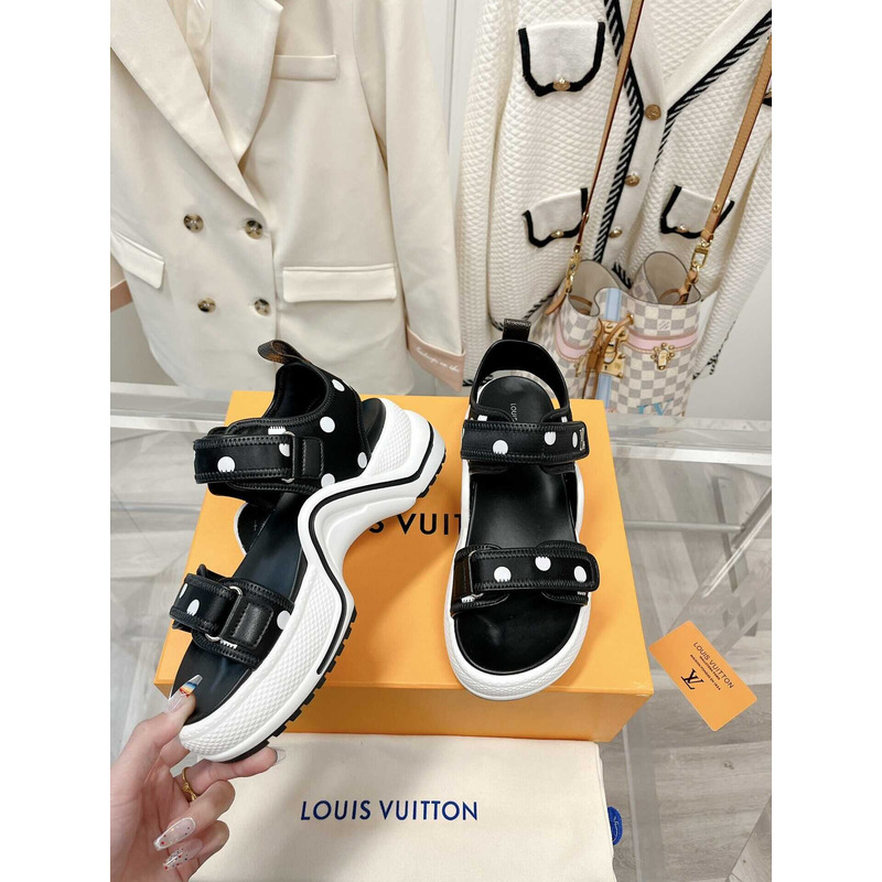 l**is V*t*n archlight sandal black and white