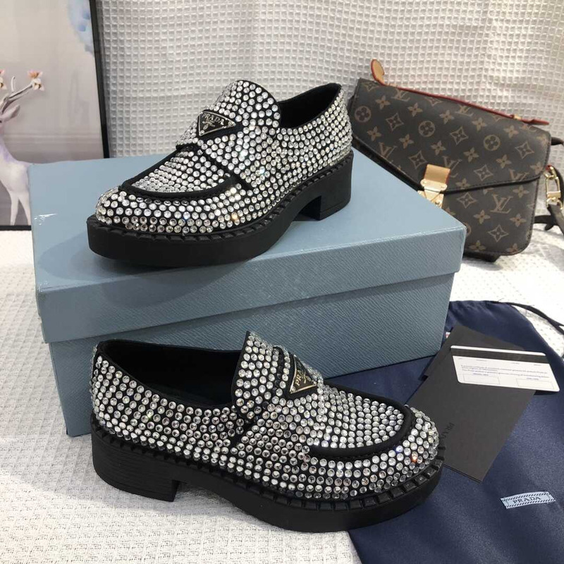 Pra*a crystal-embellished leather loafers