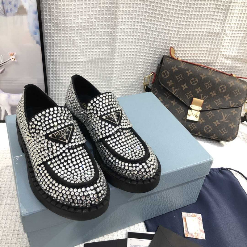 Pra*a crystal-embellished leather loafers