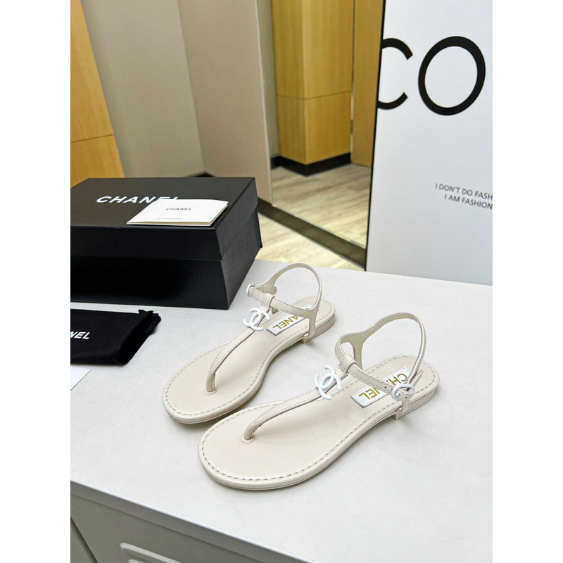Ch*el lambskin & strass sandal white
