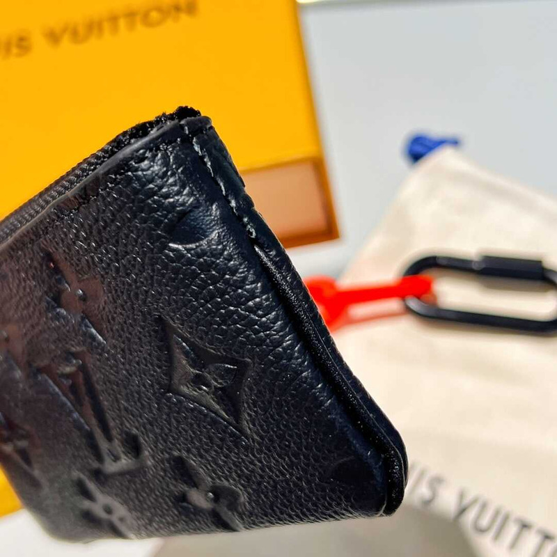 l**is V*t*n pochette cles monogram orange black