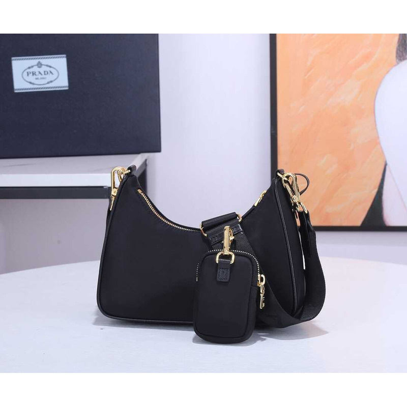 Pra*a black re-nylon bag gold hardware