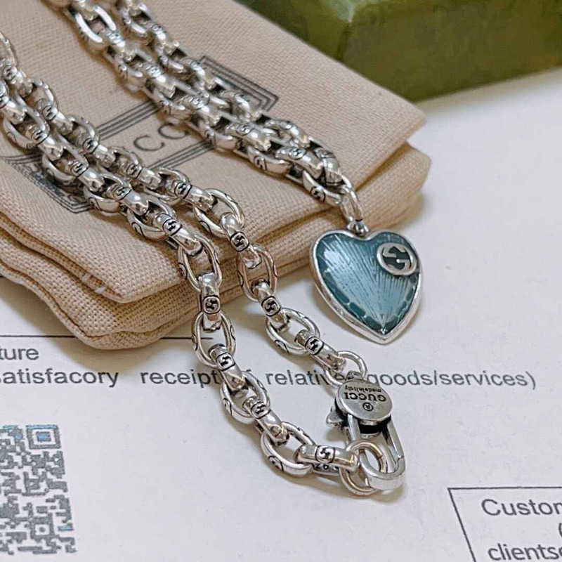 G*u*i blue heart necklace