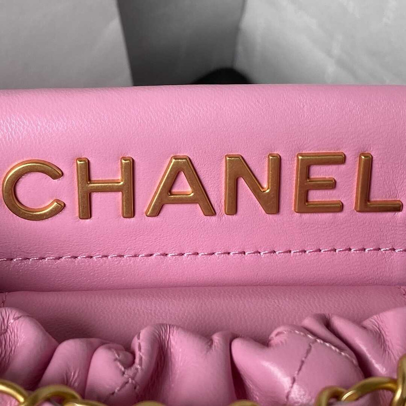 Ch*el small bucket bag lambskin resin & gold-tone metal pink
