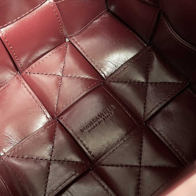 Bo*te*ga ve*ne*ta small sheepskin cassette bucket bag burgundy