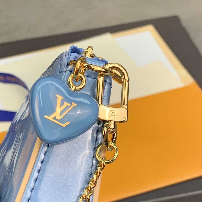 l**is V*t*n  mini pochette accessoires blue