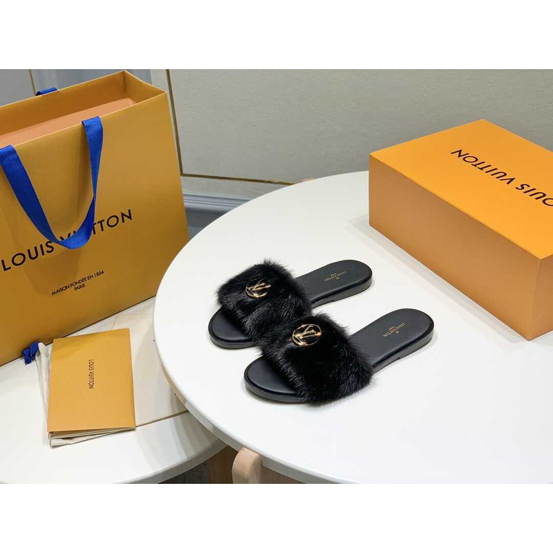 l**is V*t*n black furry slippers