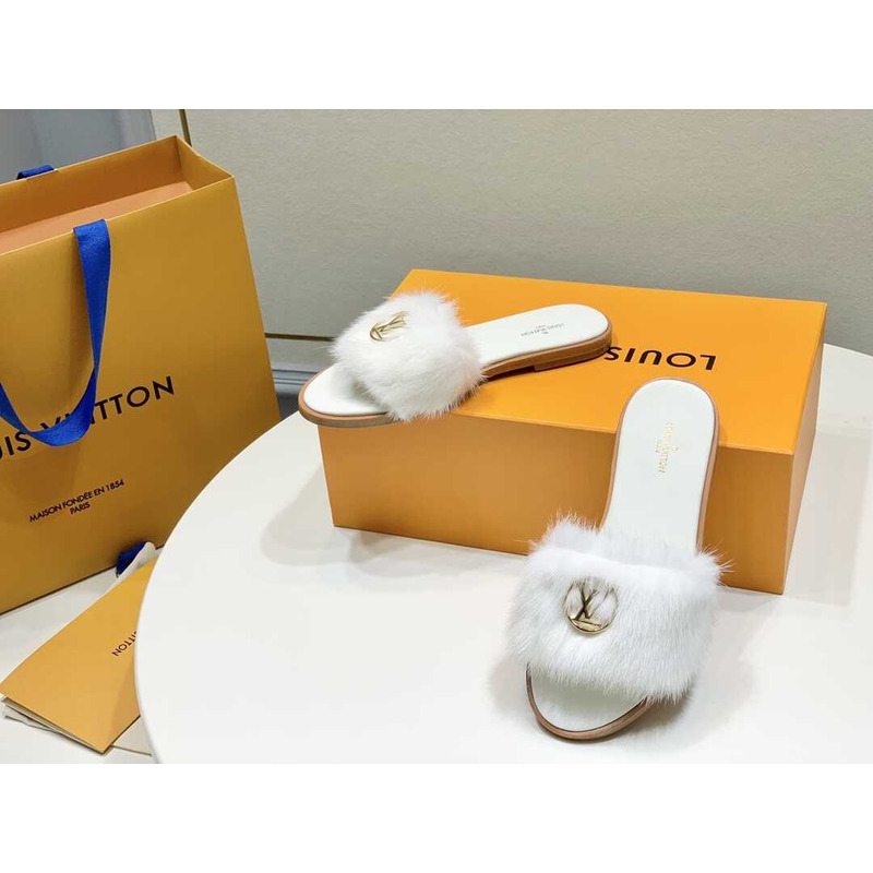 l**is V*t*n white furry slippers