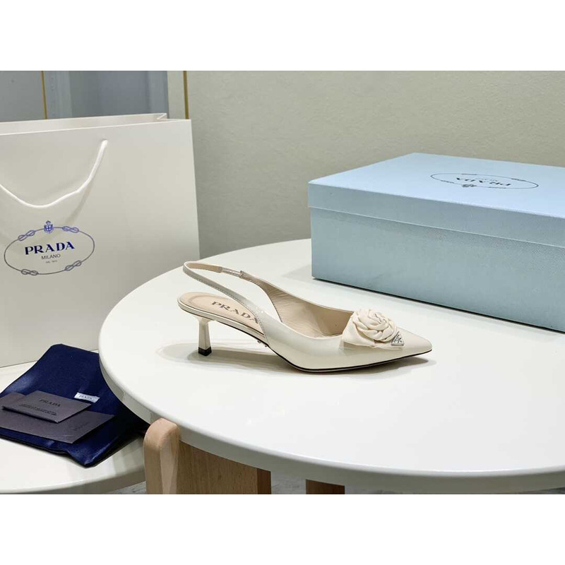 Pra*a white patent leather slingback