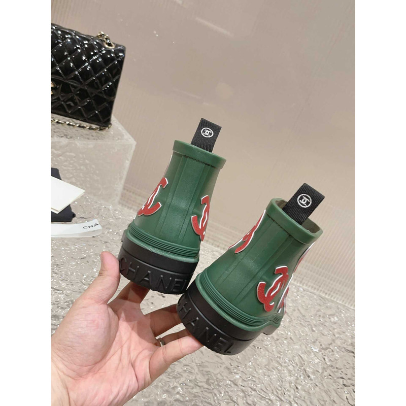 Ch*el short rain boots green and red logo