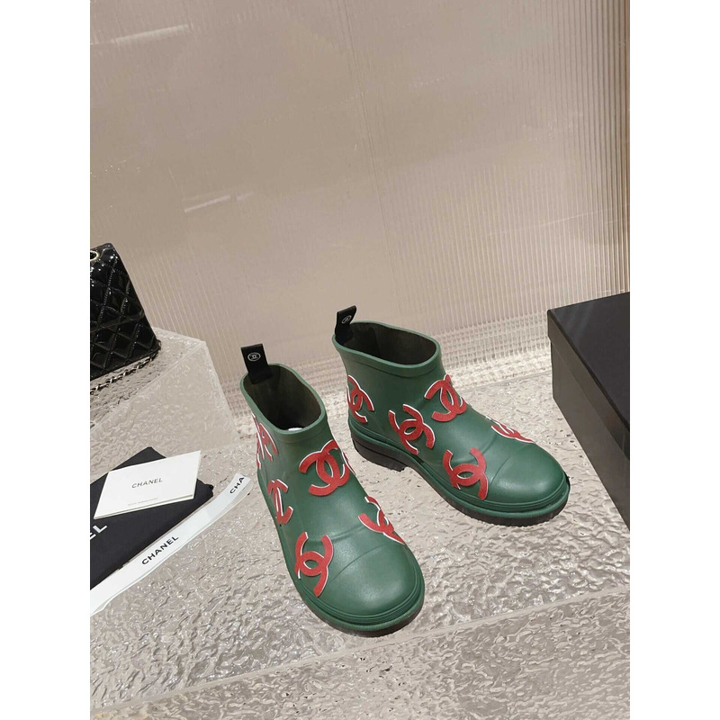 Ch*el short rain boots green and red logo