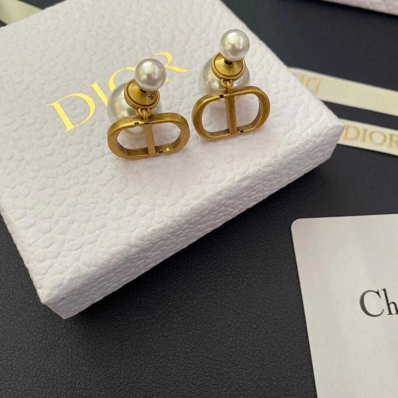D*or monogrammed pearl stud earrings