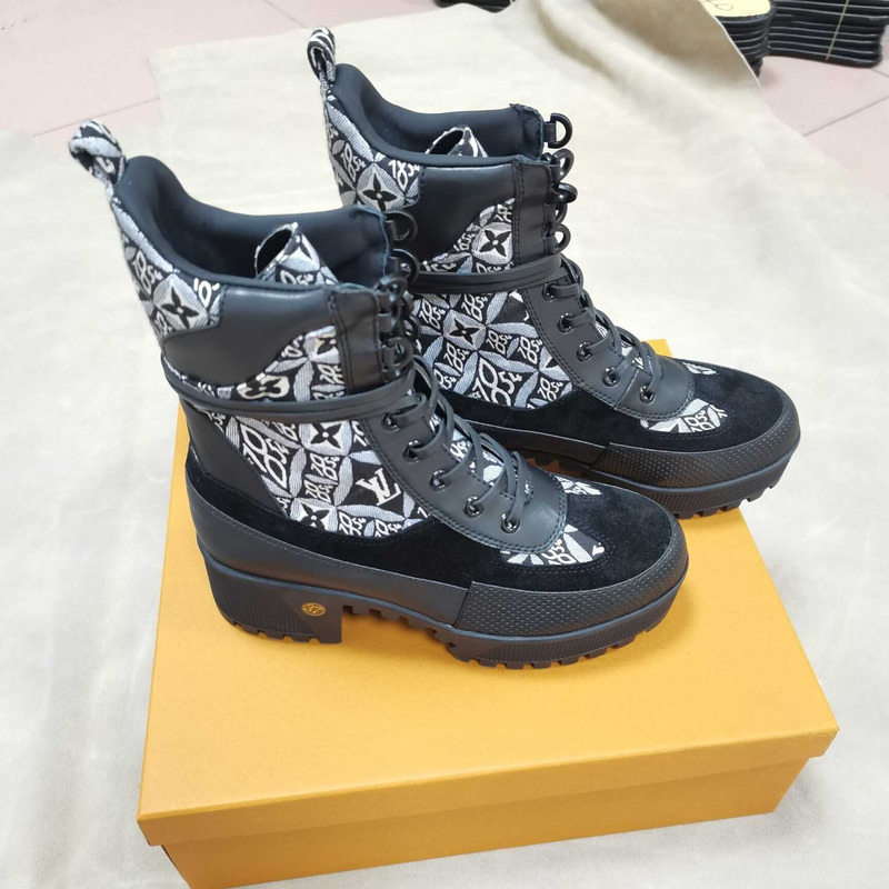 l**is V*t*n monogram canvas combat boots