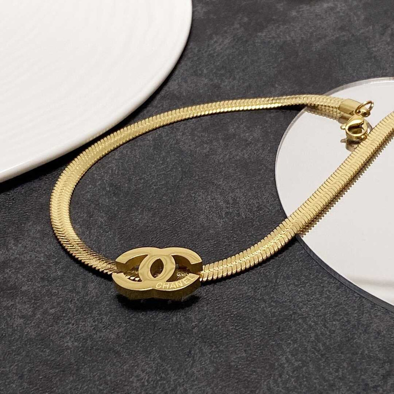 Ch*el snake bone necklace gold
