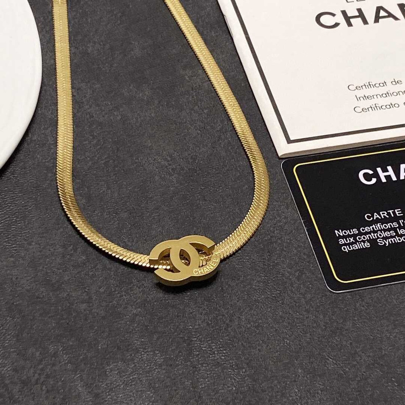 Ch*el snake bone necklace gold