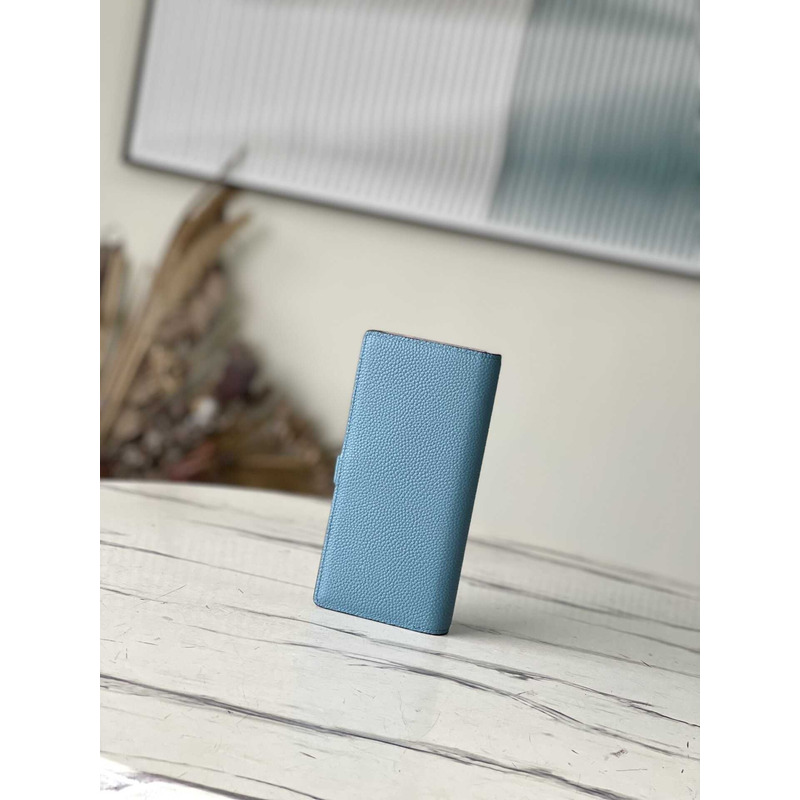 l**is V*t*n taurillon wallet blue and pink
