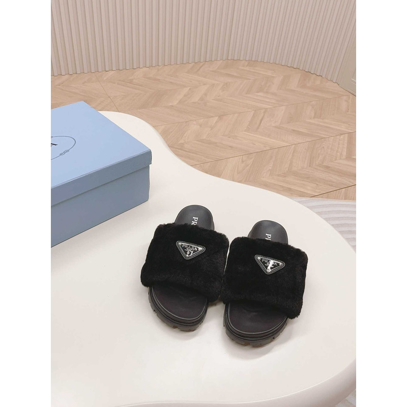 Pra*a sheepskin slip-on sandals black