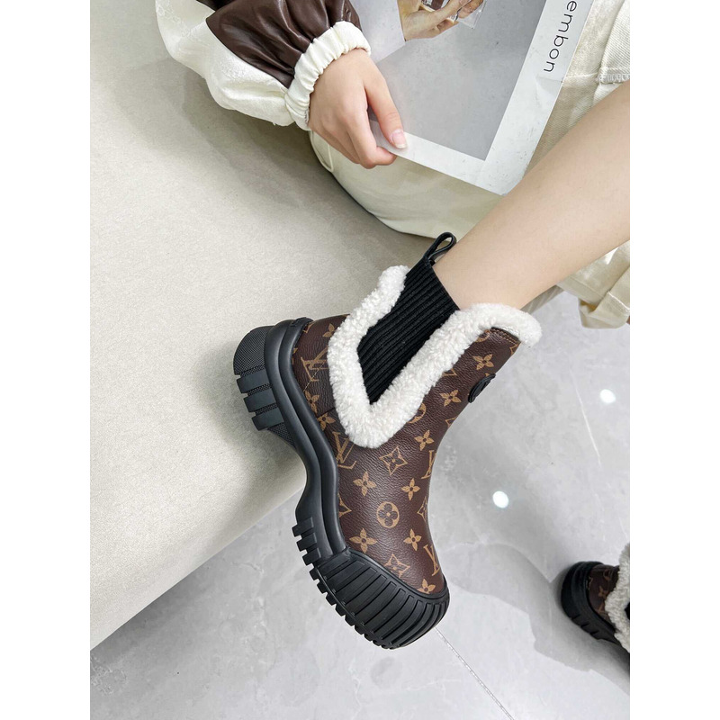 l**is V*t*n ski ruby flat ankle boot monogram