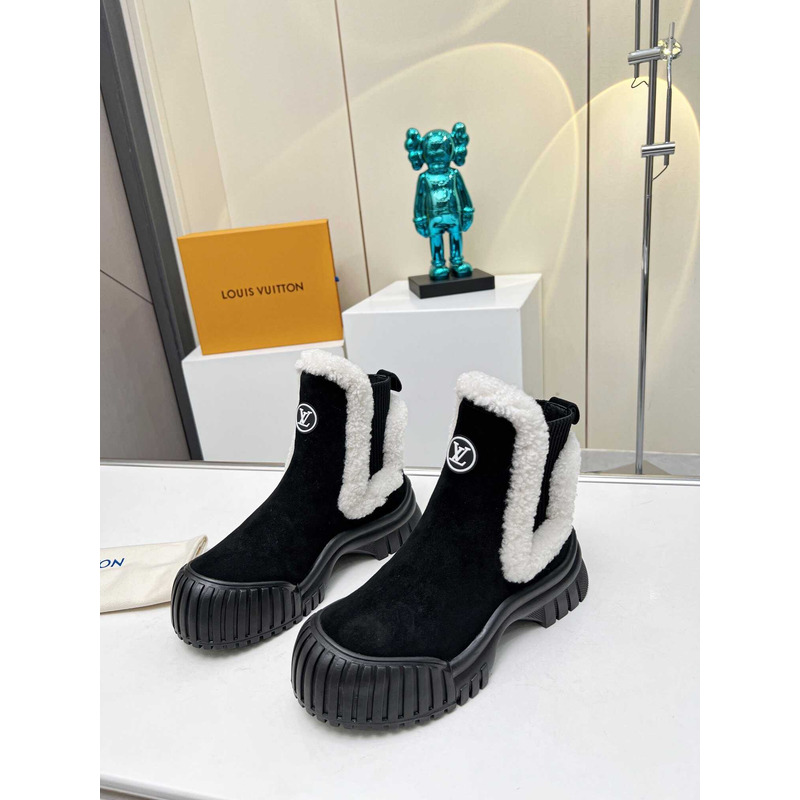 l**is V*t*n ski ruby flat ankle boot black