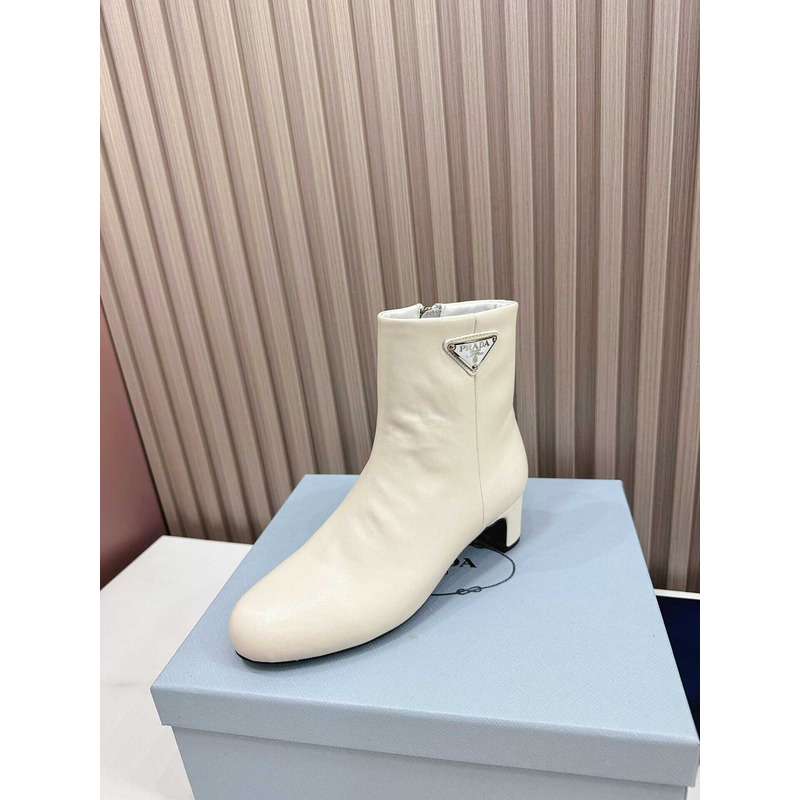 Pra*a leather ankle boots white