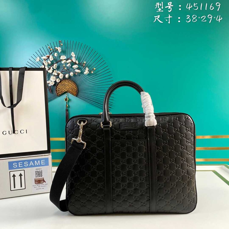 g*u*i gg S*p*e embossed leather briefcase black