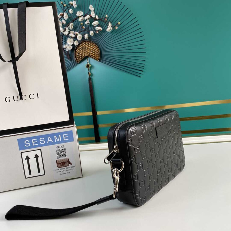 g*u*i gg S*p*e embossed clutch black