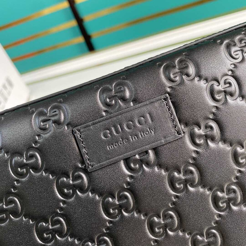 g*u*i gg S*p*e embossed clutch black