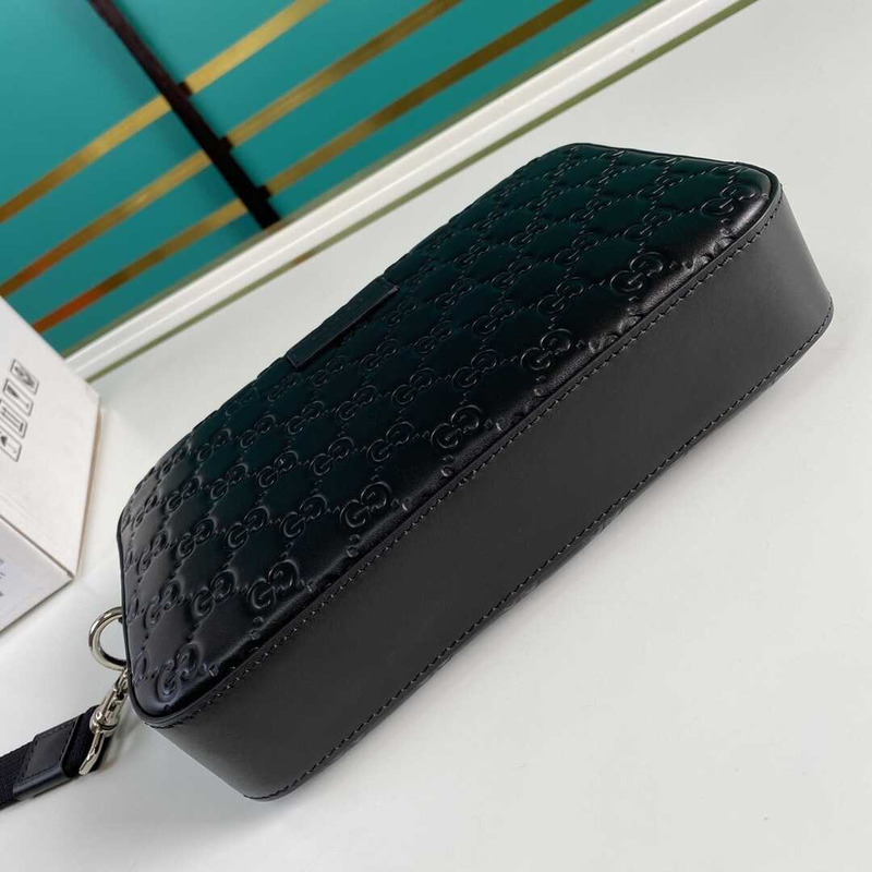g*u*i gg S*p*e embossed clutch black