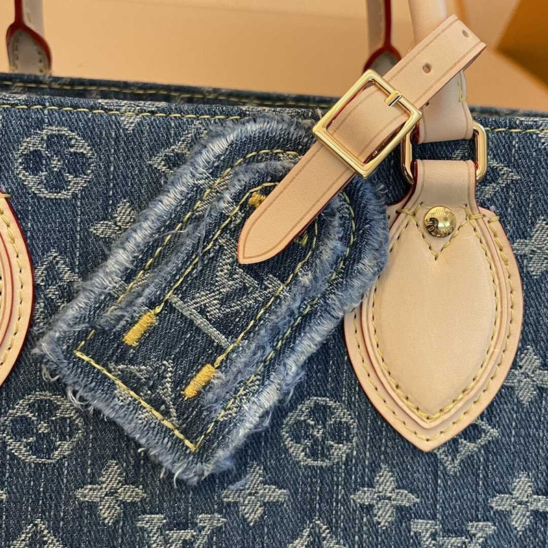 l**is V*t*n onthego mm tote bag denim blue