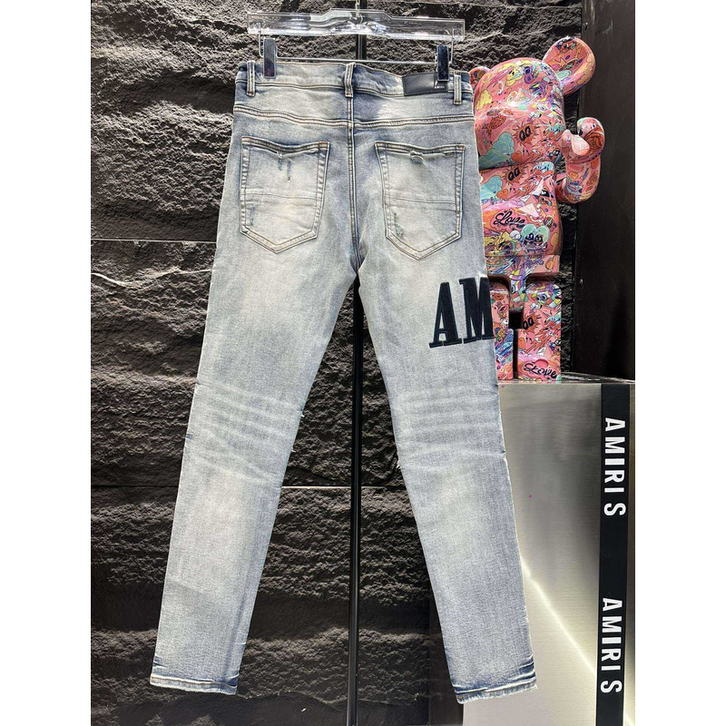 Amiri Logo Distressed Skinny Jeans Blue