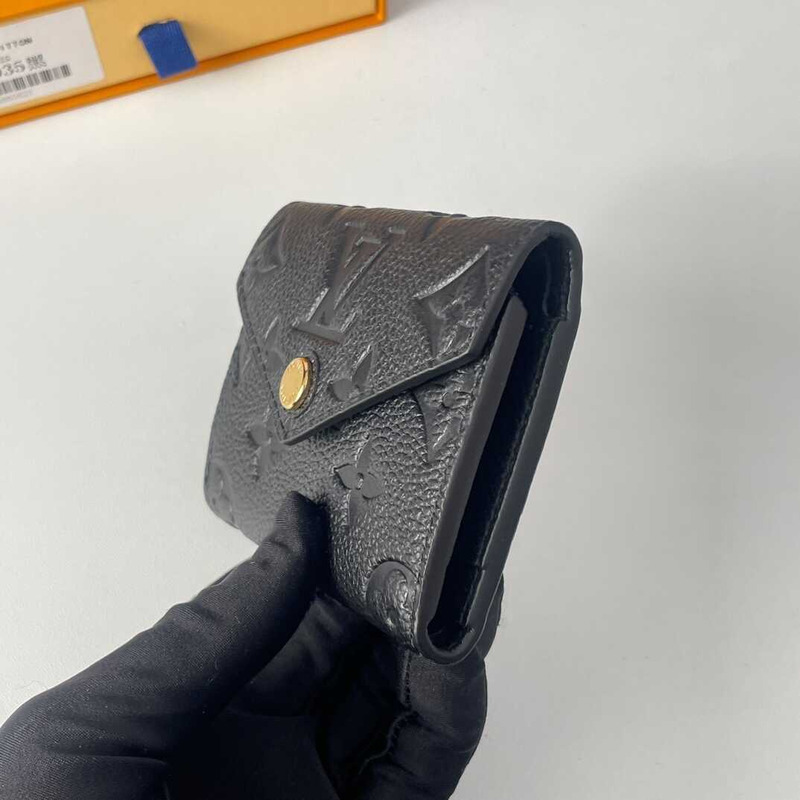 l**is V*t*n zoé wallet monogram empreinte leather black