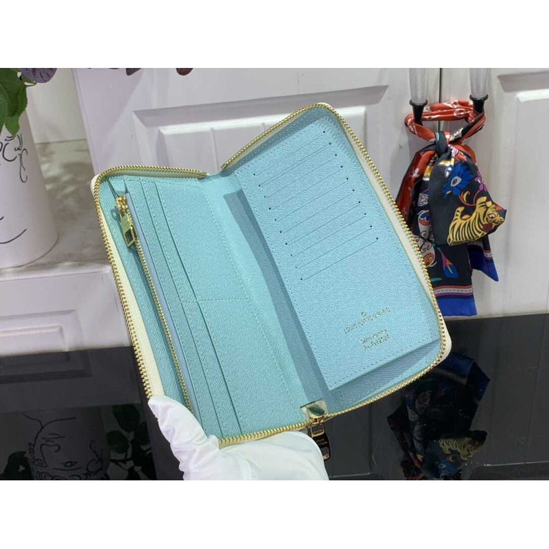 l**is V*t*n zippy wallet in muti color