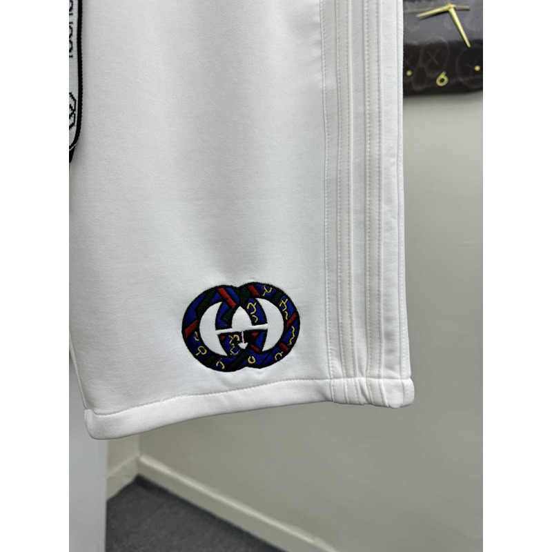 G*u*i  logo-print shorts in white