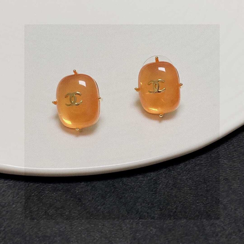 Ch*el cc logo earrings orange tone
