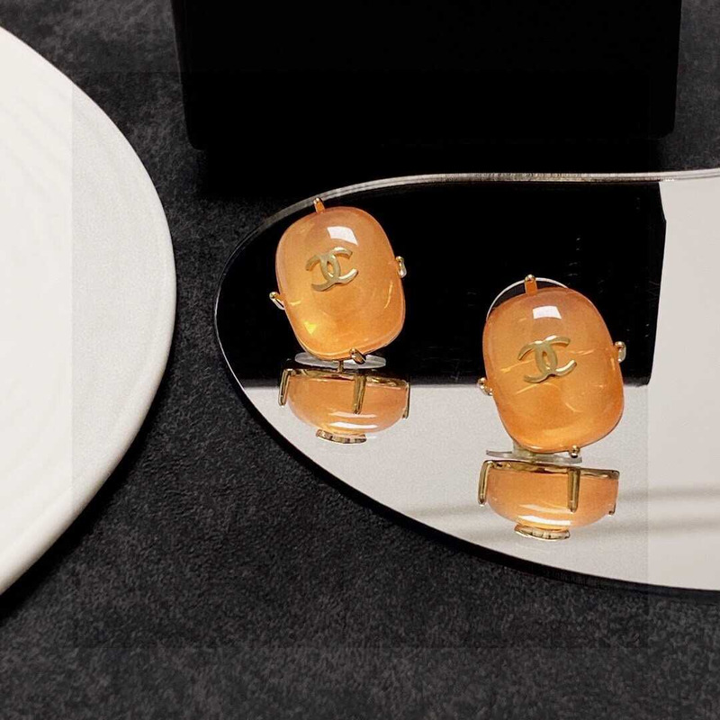 Ch*el cc logo earrings orange tone
