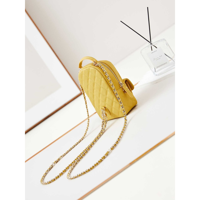 Ch*el caviar quilted cc mini classic backpack yellow