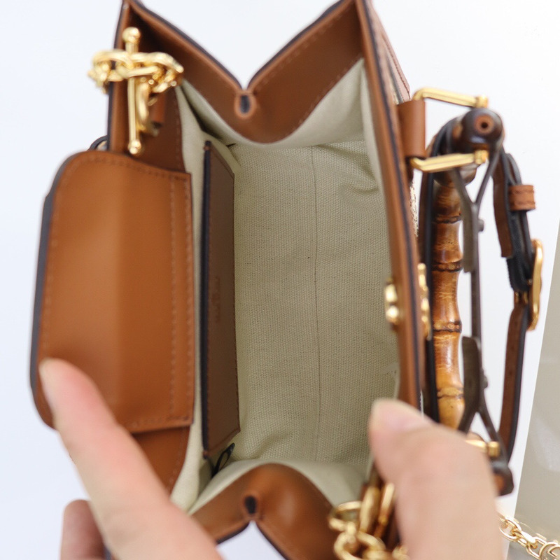 G*u*i mini tote bag camel and ebony gg canvas with crystals bag