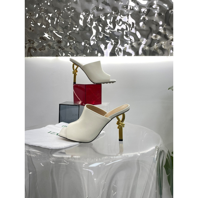 Bo*te*ga ve*ne*ta knot mule with gold finished metal knot heel beige