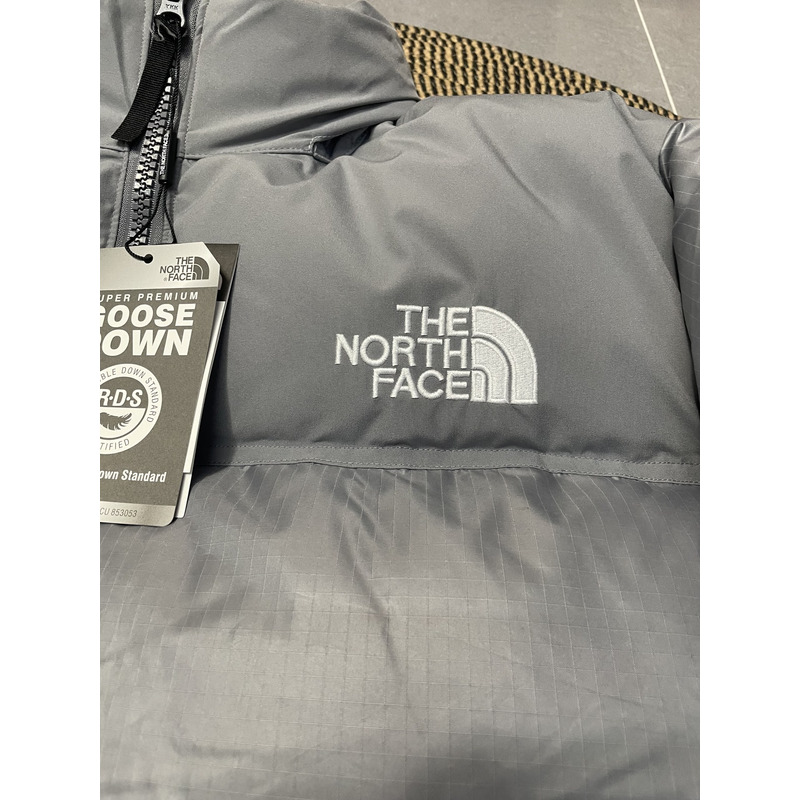 the n0*h F**e nuptse down jacket sliver