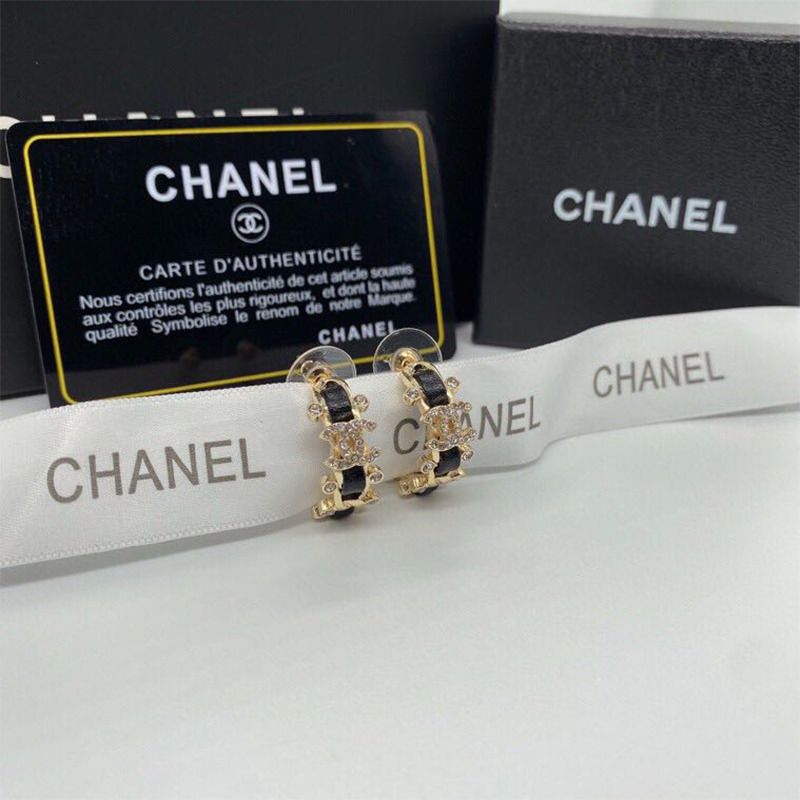 Ch*el  metal and calfskin  crystal earrings