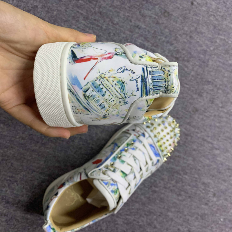 ch**an louboutin S*per perfect l**is junior spikes trainers