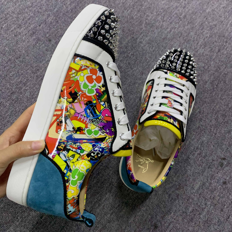 ch**an louboutin S*per perfect l**is junior spikes trainers
