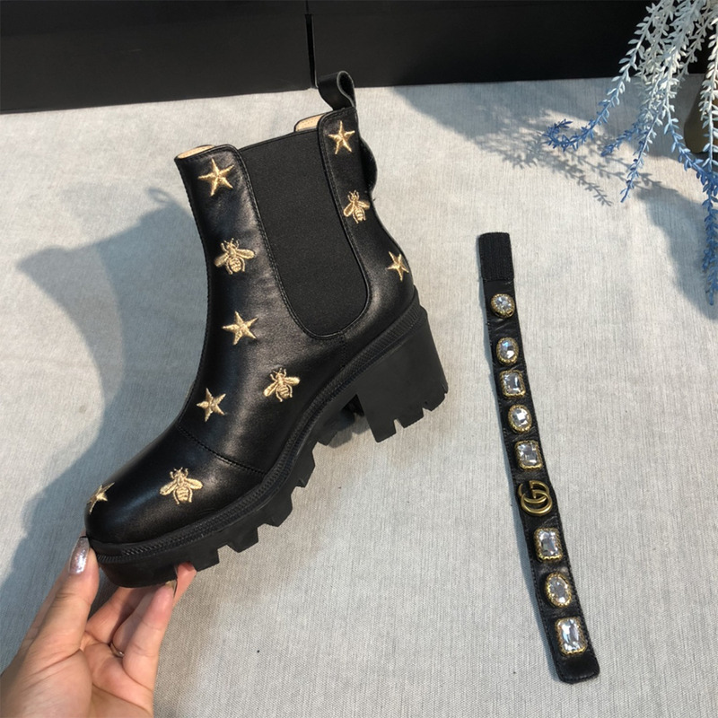 G*u*i embroidered leather ankle boot with belt