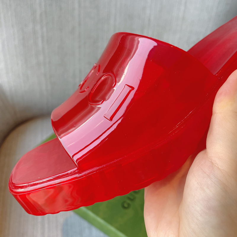 G*u*i plastique logo-embossed rubber mules